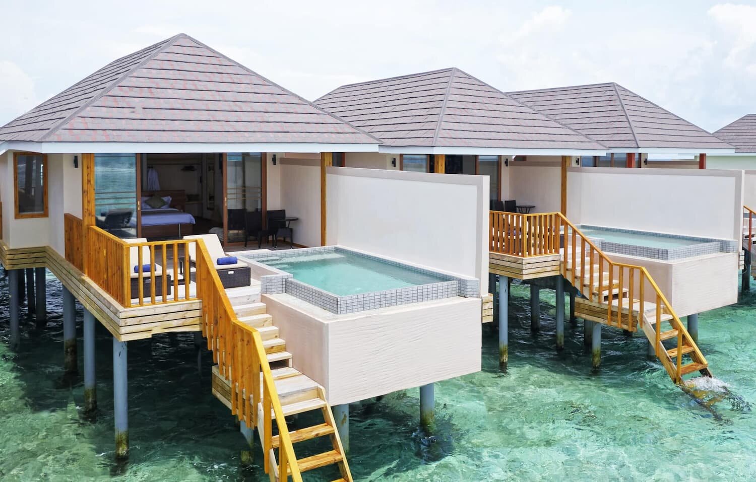 Ocean Pool Villa with private overwater pool at Brennia Kottefaru