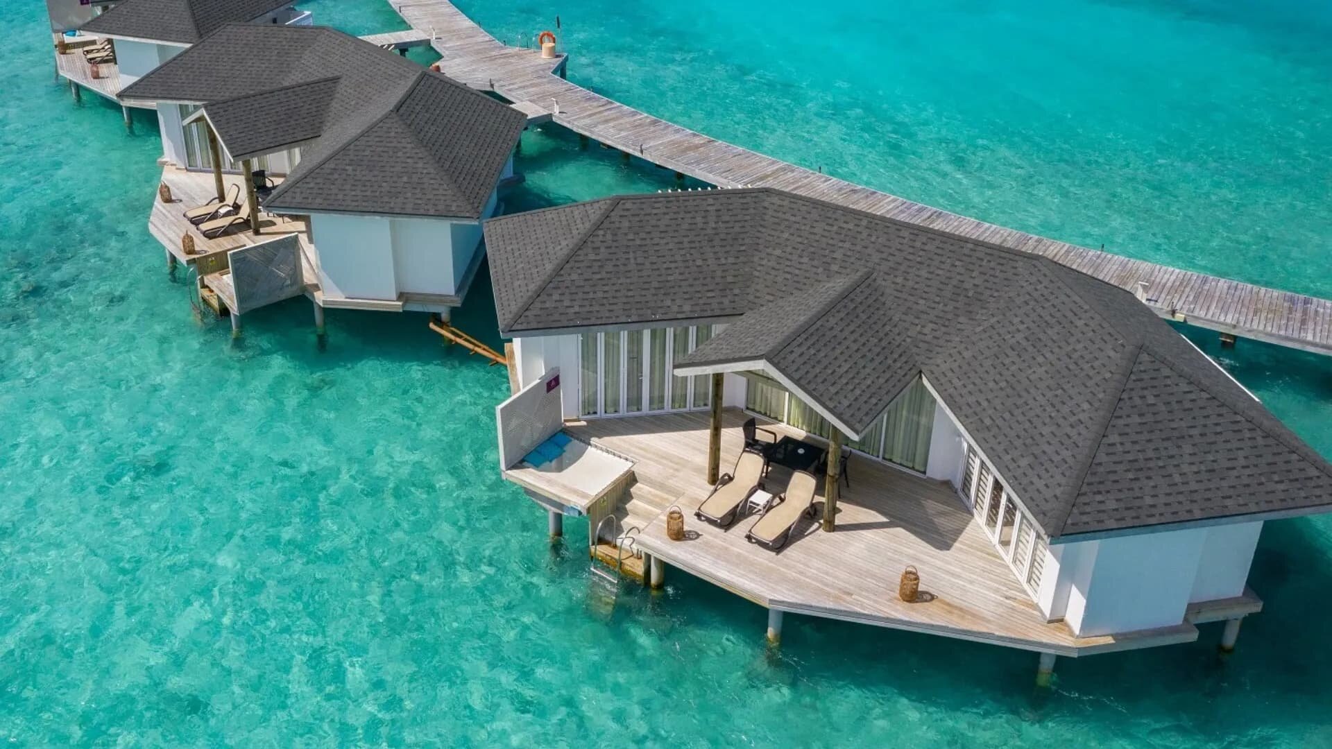Over Water Suite with glass floor panel and lagoon deck, Cinnamon Dhonveli