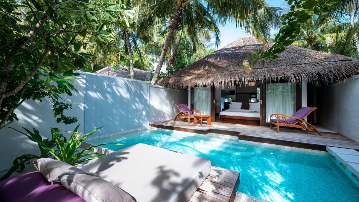 Beach Villa with Pool at Coco Bodu Hithi opening onto the sand