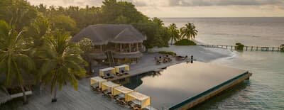 Latitude cocktail bar beside the infinity pool at Coco Bodu Hithi