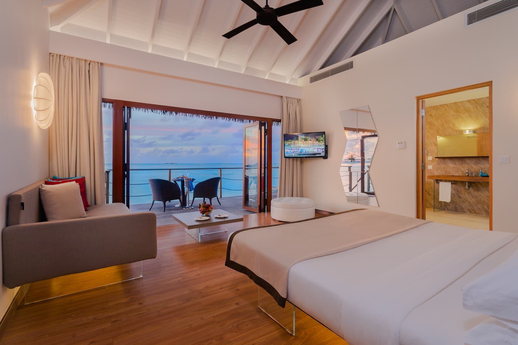 Overwater Lagoon Villa at Cocoon Maldives with steps into the lagoon